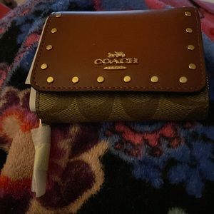 Coach small wallet. Brand new. Khaki and brown. Tri fold wallet.